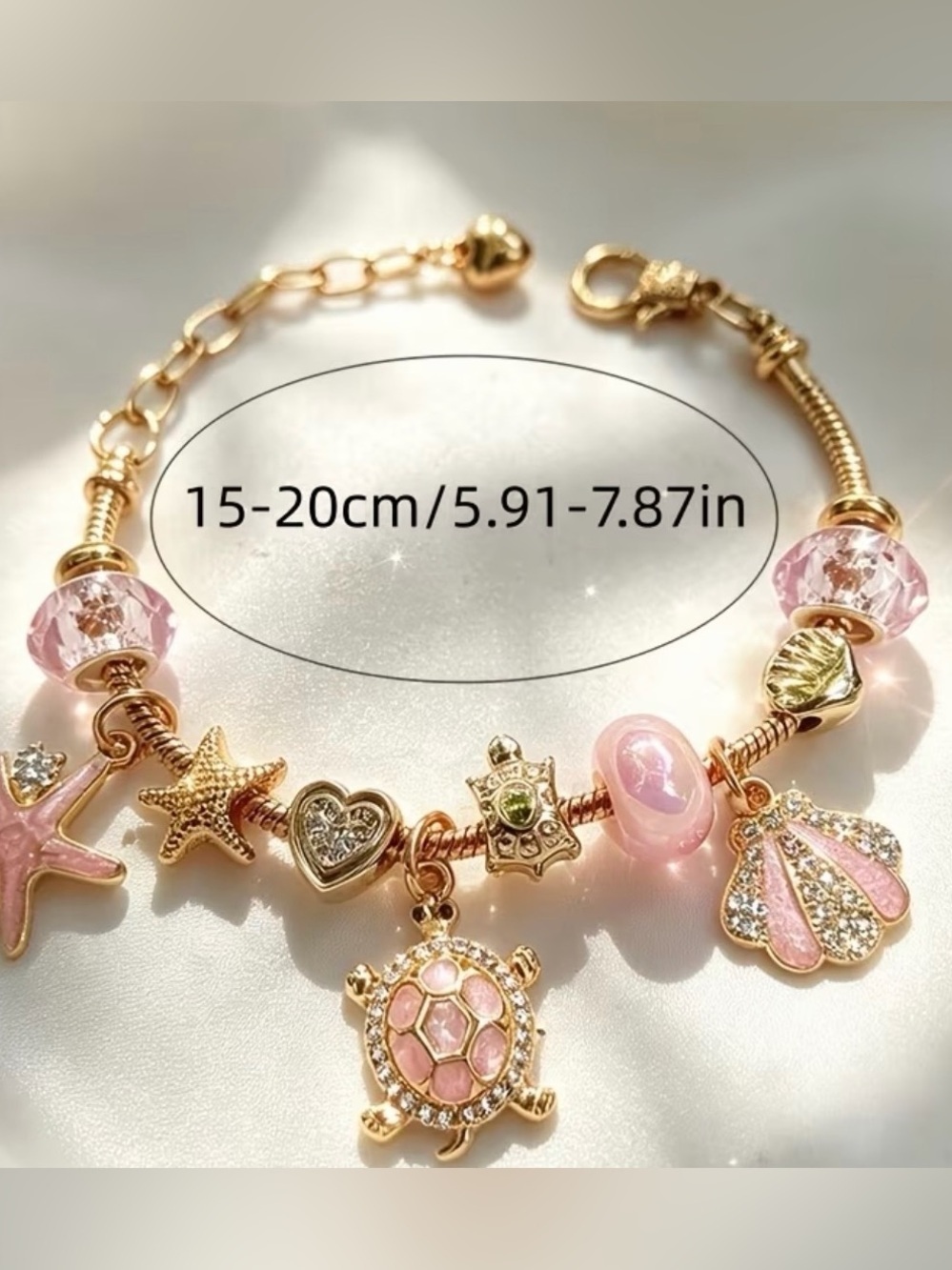 Gold-Tone Pink Sea Charm Bracelet. - Picture 4 of 8